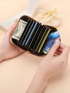 Pink minimalist accordion wallet with multiple card slots and cash compartment