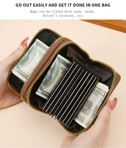 Detail view of the dual-zipper leather accordion wallet with large storage capacity