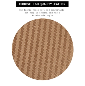 Detail of high quality brown woven leather texture on a soft and stylish women's card holder