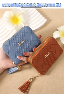 Detailed view of women's quilted short wallets in blue and brown with tassel zippers