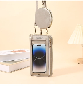 Dettaglio della borsa per telefono con finestra touch e portamonete rotondo staccabile