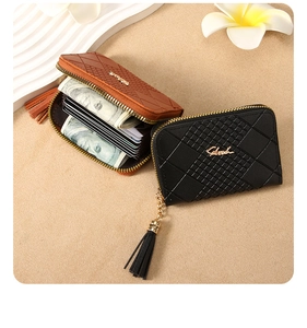 Detail of plaid embossed leather card wallets with tassel zipper and multi-slot interior