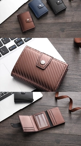 Close-up of carbon fiber textured tri-fold wallet with RFID metal case and ID window