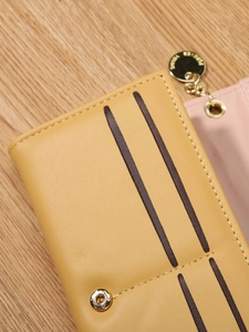 Mustard yellow leather long wallet for women with multi-card slots and gold pendant