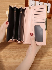 Pink long bifold faux leather wallet for women with multiple card slots and double zippers