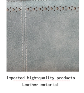 Detailed macro view of gray leather wallet with laser-cut holes and white stitching