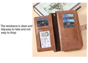 Detail view of the brown leather wallet showing multiple card slots and ID window