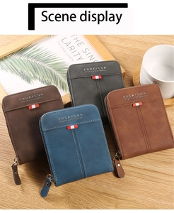 Detailed view of four retro men's bifold wallets in assorted colors on a wooden table