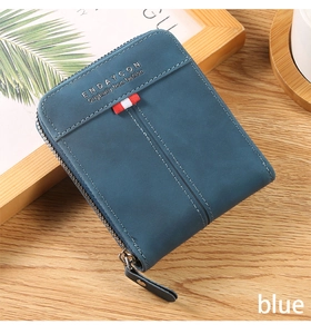 Detail of blue leather men's wallet featuring L-shaped zipper and decorative ribbon