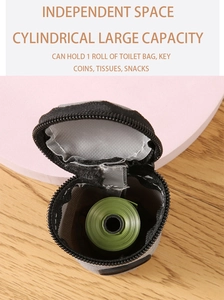 Detail view of the mini portable pet waste bag dispenser showing internal storage space