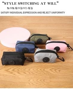 Detail of multi-color oxford cloth pet waste bag dispensers with metal carabiners
