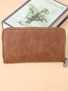 Retro brown long leather wallet for men with textured finish and secure zip closure