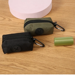 Detail of durable nylon pet waste bag dispenser with metal carabiner and rubber outlet