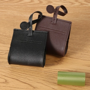 Leather pet waste bag dispenser in black and brown colors with a portable hanging loop