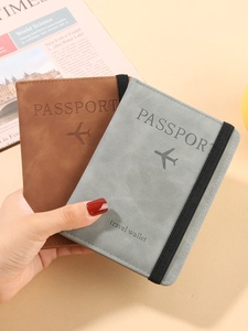 Brown and gray PU leather passport holders with elastic straps and embossed travel icons