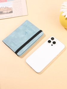 Light blue textured PU leather passport cover with elastic strap and plane icon design