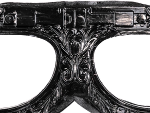 Close-up of steampunk goggles featuring intricate floral vine and baroque style relief
