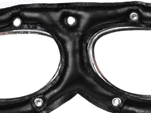 Macro detail of steampunk goggles featuring black litchi leather and silver metal rivets