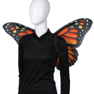 Detail of Monarch Butterfly wings with orange patterns and black elastic straps for cosplay