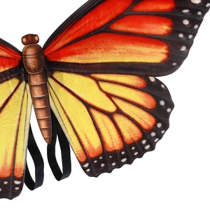 Detail of Monarch butterfly wings costume with elastic straps and vivid orange patterns