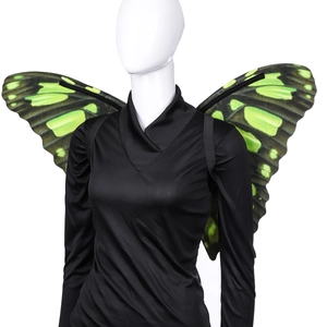 Detail of green and black butterfly wings with elastic straps for costume party use