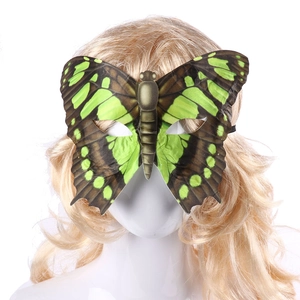 Detail of green and brown butterfly masquerade mask with vibrant realistic wing patterns