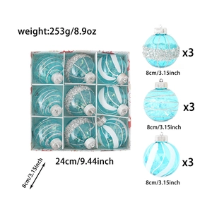 Detail of 9-piece sky blue 8cm Christmas ball set with glitter and spiral textures