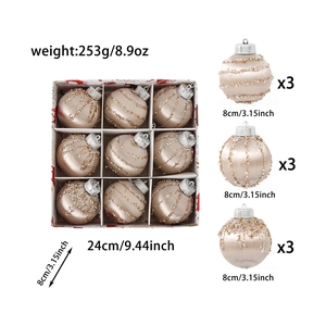 Detail of 8cm champagne Christmas balls with gold sequins and beads in a 9-piece set