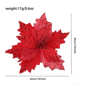 Detail of red glittered poinsettia artificial flower for Christmas tree decoration