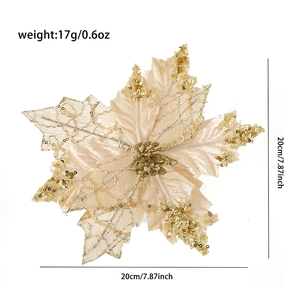 Close-up of champagne gold poinsettia flower with glitter sequins and lace texture