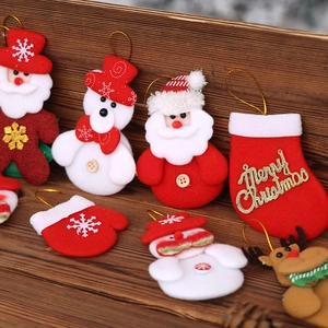 Cute Christmas fabric doll ornaments set with Santa, snowman and reindeer on wood
