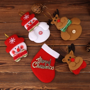 Christmas tree ornaments set featuring Santa, snowman and deer on wooden background