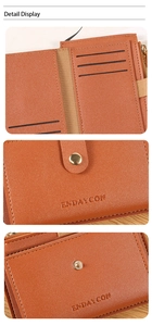 Detail of brown leather wallet with multi-card slots, zipper pocket and snap closure