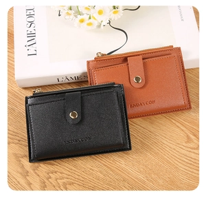 Detail of ultra-thin lychee grain PU leather wallet with zipper and metal buckle