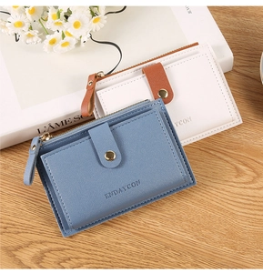 Litchi pattern leather wallet detail with card slots, zipper pouch and U-shaped snap button