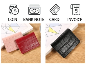 Detailed macro view of crocodile pattern leather wallet with multiple card and coin slots