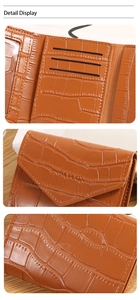Detail display of brown crocodile pattern card holder with card slots and inner structure