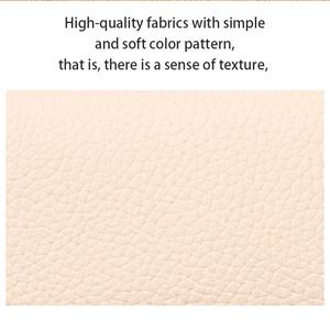 Macro shot of premium beige pebble grain faux leather material with elegant texture