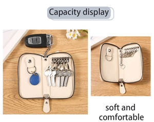 Detail of PU leather key case showing interior capacity with 6 silver hooks and key ring