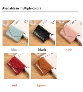 Close-up of stylish faux crocodile leather wallets in five different vibrant colors