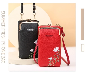 Close-up of floral embroidery and lychee texture on two crossbody phone bags