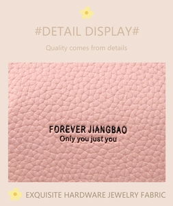 Detail of pink lychee leather phone bag with embossed Forever Jiangbao branding text