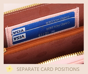 Detail of pink leather phone bag interior showing card slots and golden zipper