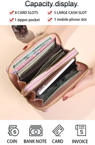 Detail view of pink double zipper wallet interior with multi-card slots and phone pocket
