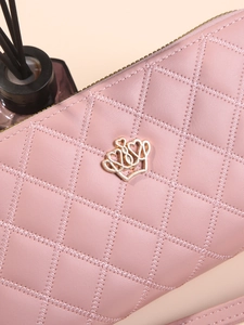 Pochette matelassée rose à double fermeture éclair avec logo couronne de cœurs