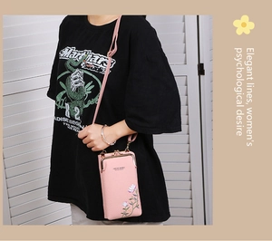 Pink lychee texture crossbody phone bag featuring elegant floral embroidery detailing
