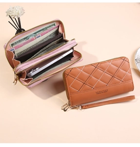 Detailed view of women double zipper wallet interior with card slots and phone pocket