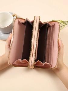 Elegante portafoglio lungo da donna con doppia cerniera in pelle rosa e molti scomparti