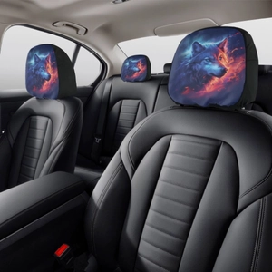 Detailed view of car headrest covers with artistic wolf head print on black fabric
