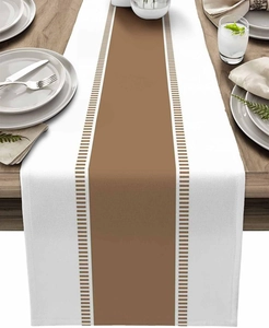 Detail of modern white and brown striped table runner with cotton linen fabric texture
